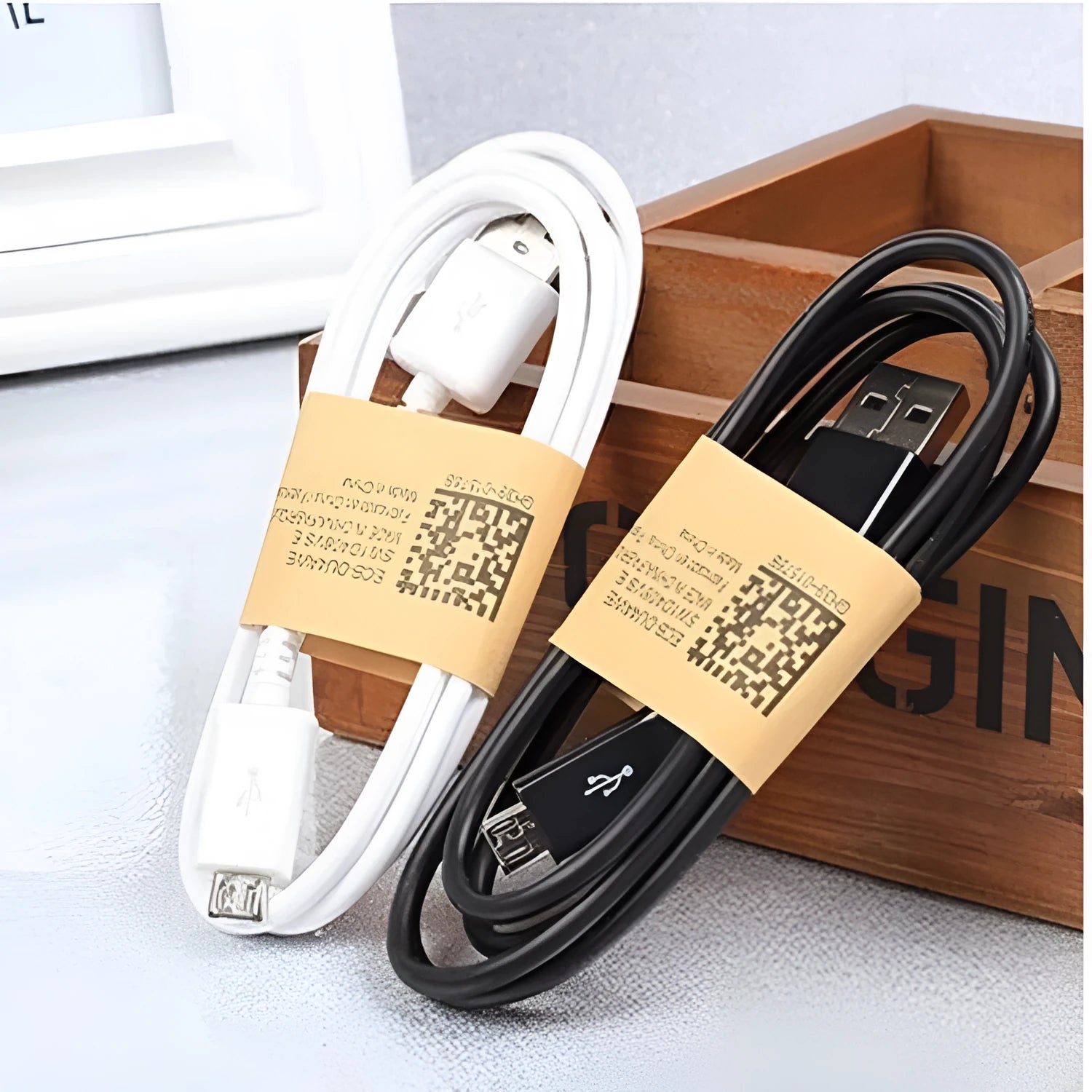 Black and white Android Micro USB data cable for phone and tablet charging, 1 metre long.