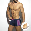 Men's polka dot print swimming boxers in quick-dry nylon fabric on a size chart.
