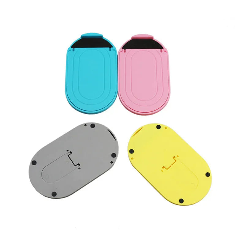 Plastic lazy bracket mobile phone stand in one of six colour options: black, blue, grey, pink, white, or yellow.