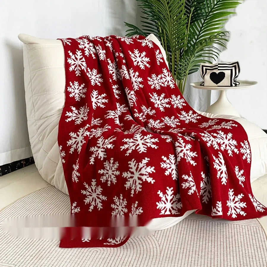 Christmas acrylic blanket showing snowflake or reindeer pattern in casual style