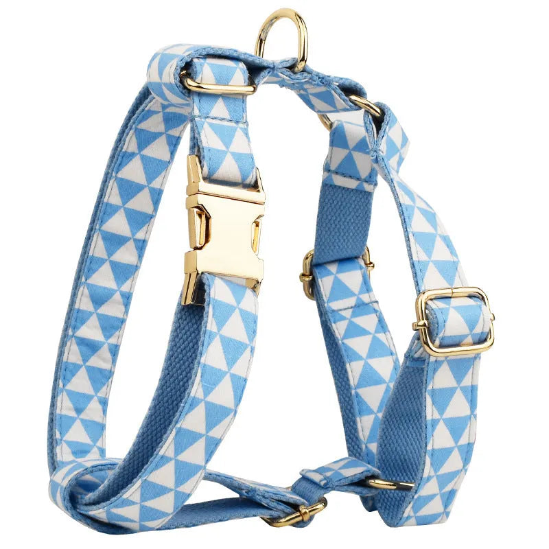 Blue cloth dog collar, leash, bow, and vest four-piece pet accessory set with triangular ring rope design.