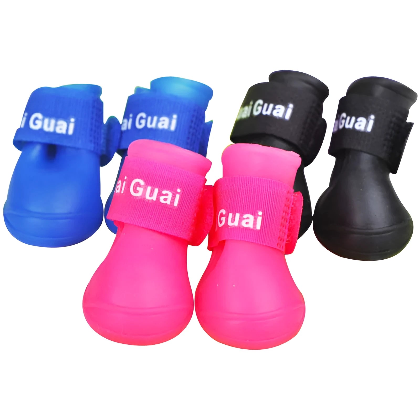Soft silicone pet rain boots in royal blue on a wet pavement, non-slip sole visible