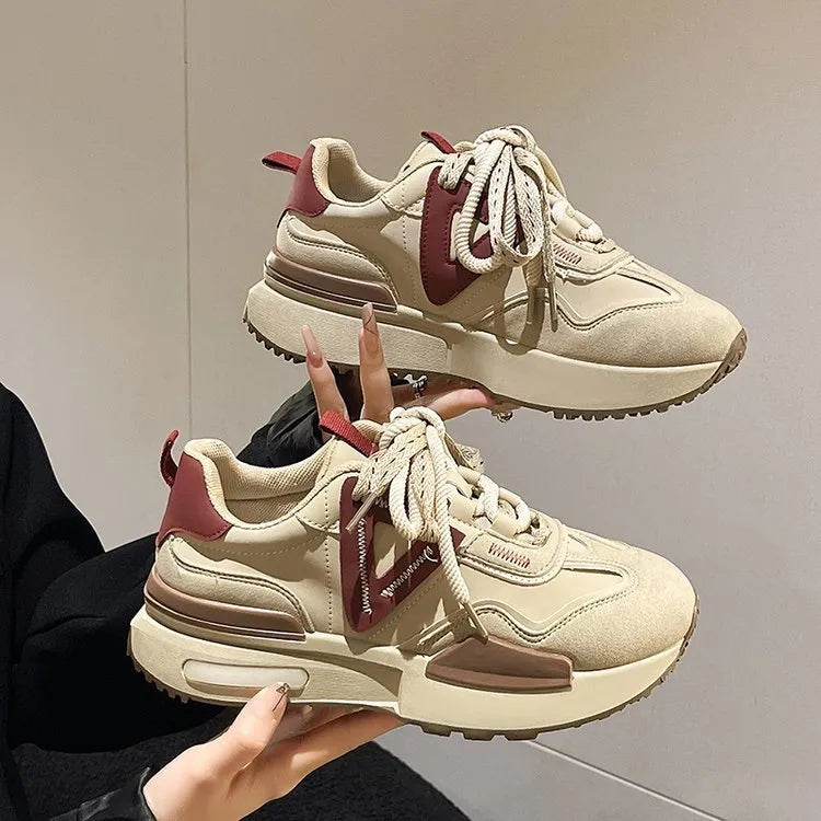 Women's black and khaki red retro platform sports shoes with lace-up front and rubber sole.