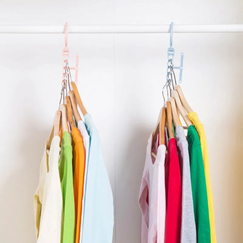 Blue revolving wardrobe hanger with five rotating branches and handle for space saving
