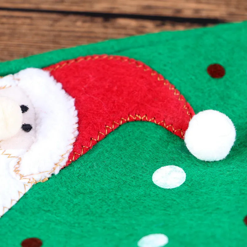 Christmas wine bottle cover in red snowman suit on a standard bottle