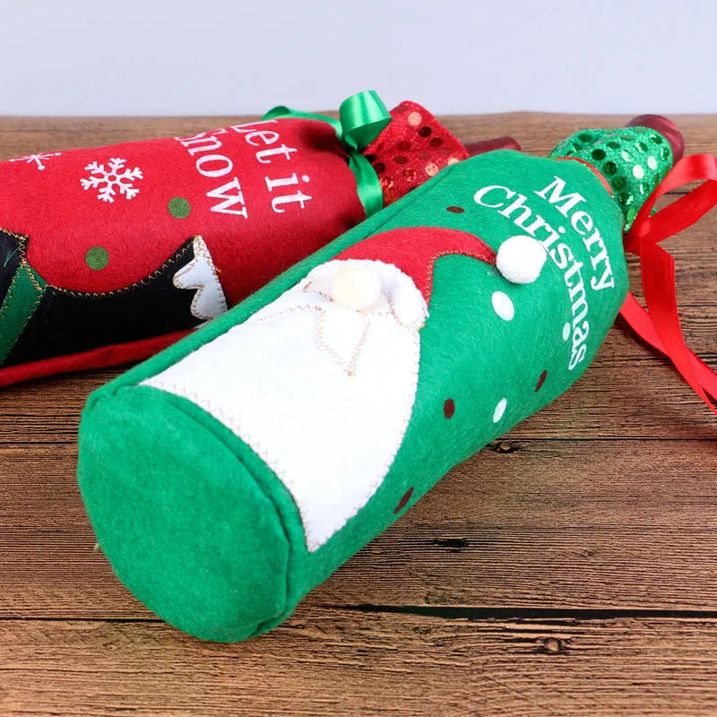 Christmas wine bottle cover in red snowman suit on a standard bottle