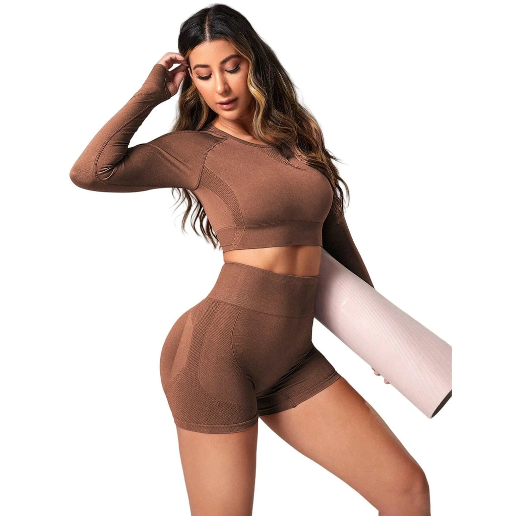 Women's black high waist yoga suit with long sleeves and matching pants