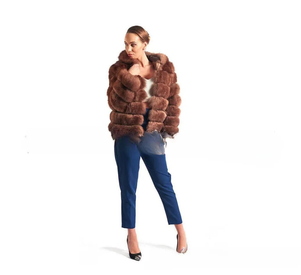 Loose fit women's hooded coat in artificial fur, shown in brown colour, street fashion style.