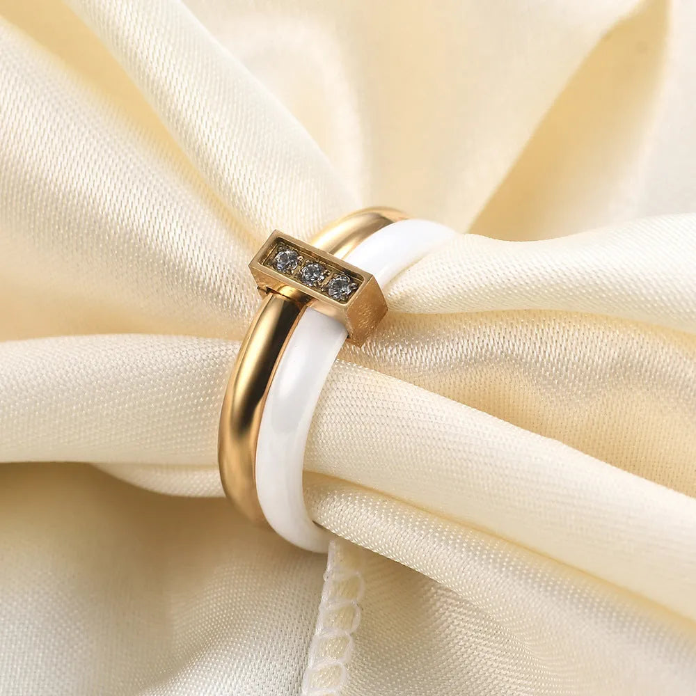 Women's ceramic ring with 6mm wide band and glossy zirconium inlay in steel black finish.