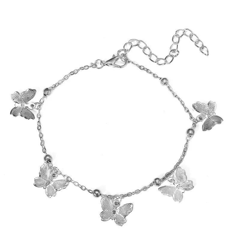 Alloy butterfly anklet for women in gold finish on ankle, hollow design beach foot ornament