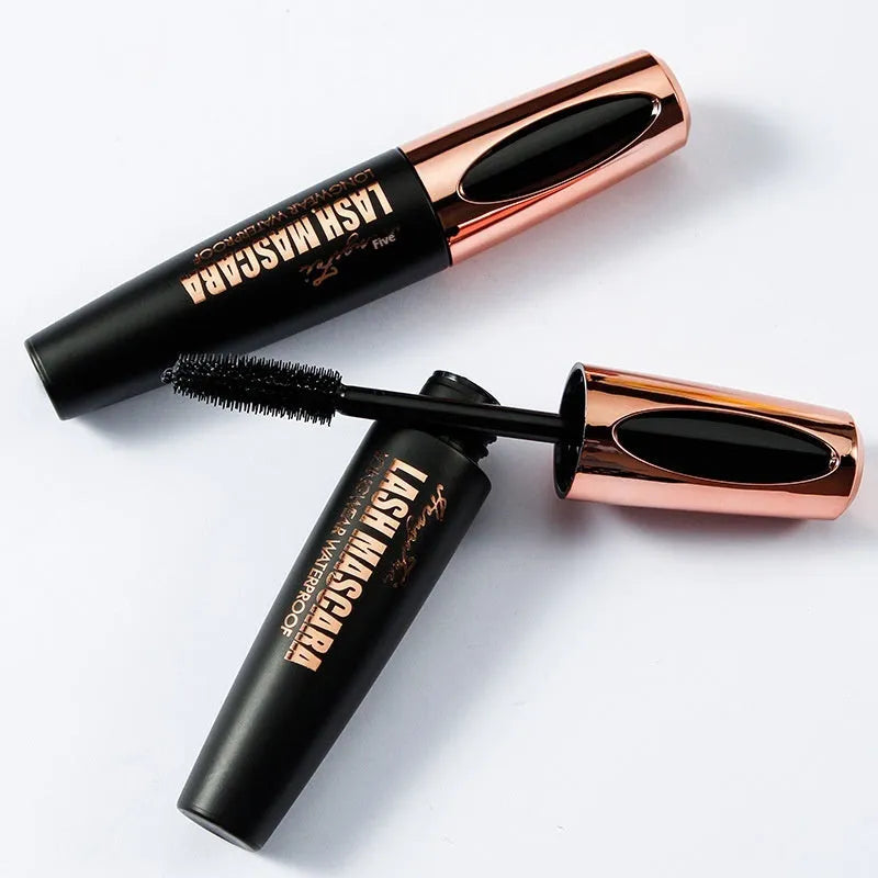 Black waterproof mascara with applicator creating thick long curled lashes