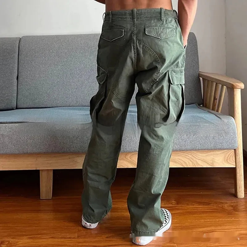 Men's loose cotton paratrooper trousers in Army Green with mid rise zipper fly
