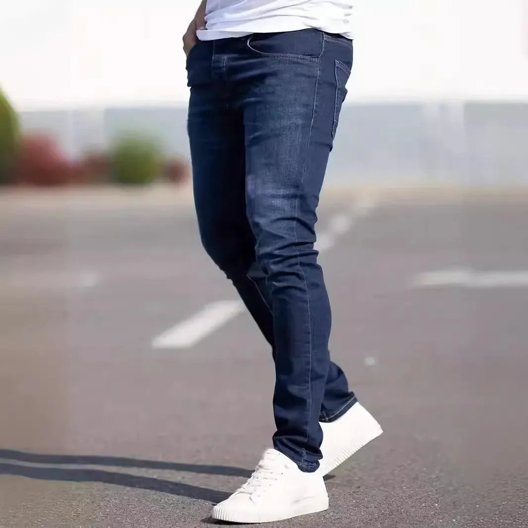 Men's dark blue slim street fashion jeans with mid waist and zipper fly