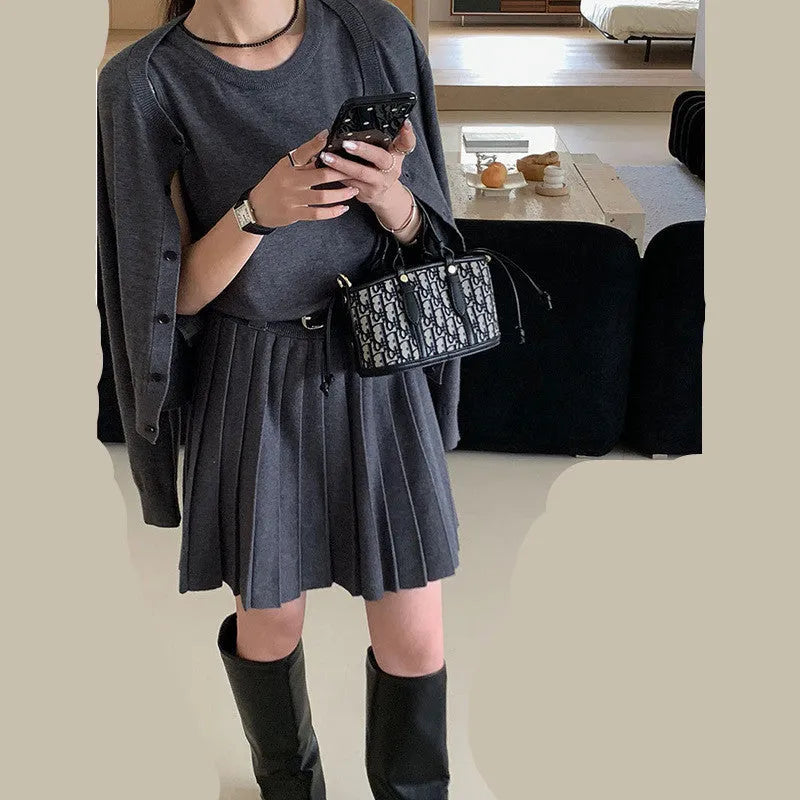 Women's black knitted vest skirt and cardigan two-piece set with 3D pattern and adjustable belt