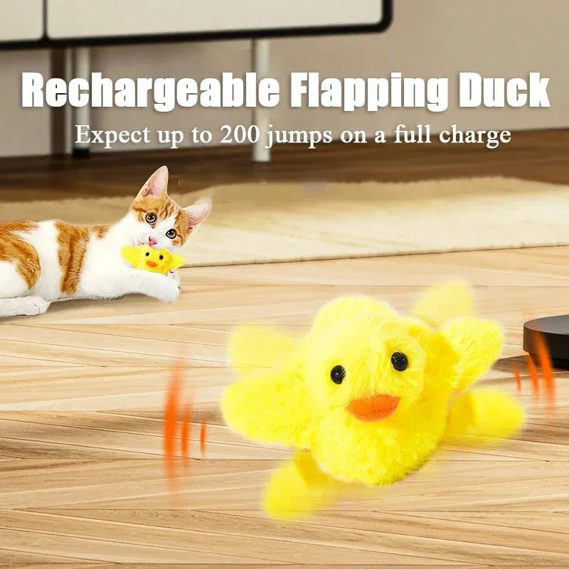 Yellow polyester plush duck cat toy with electric flapping wings on green background