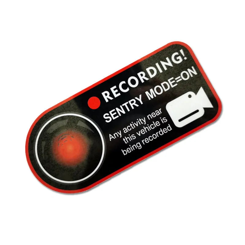 Pair of white electrostatic warning stickers for Tesla Sentry Mode on a car window.