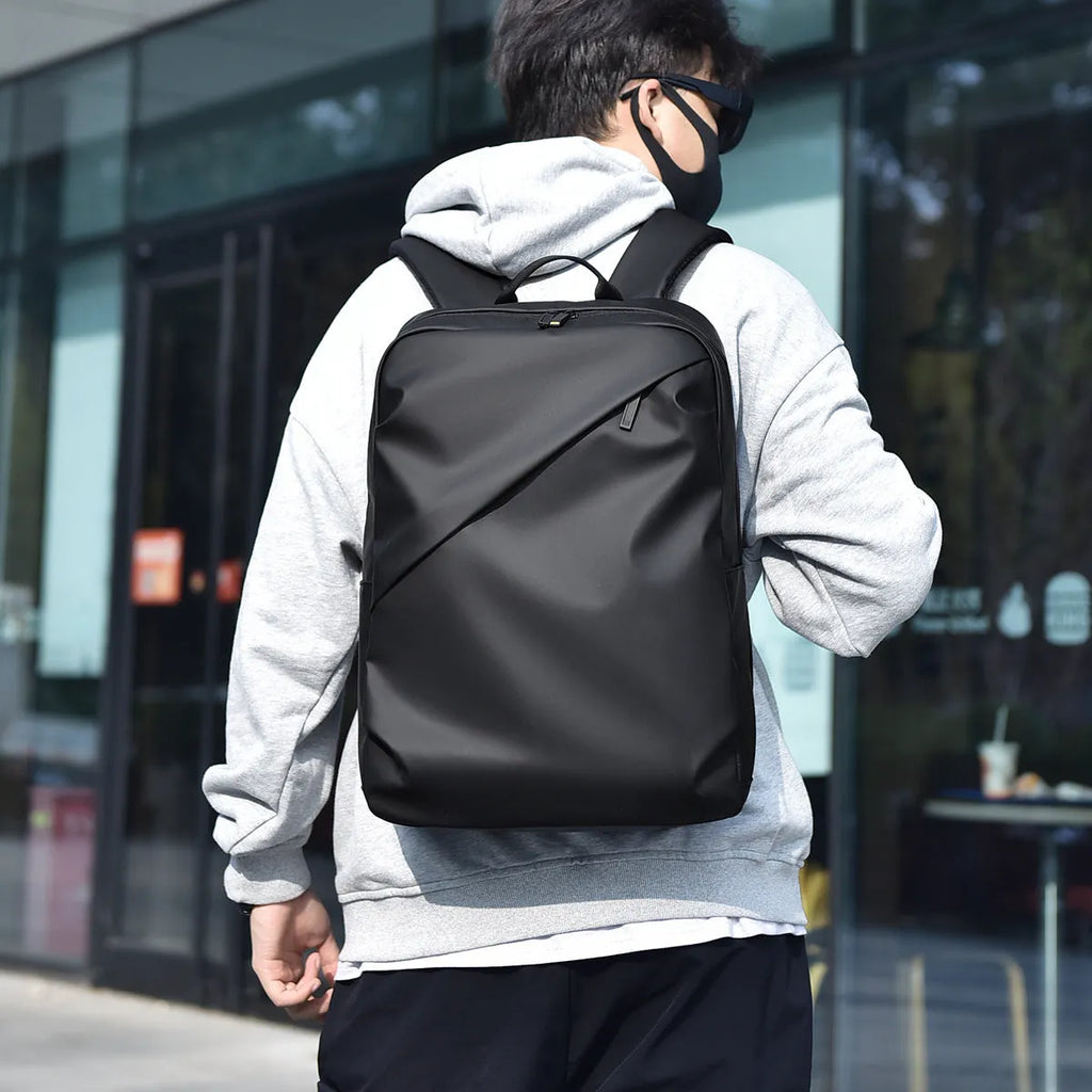 Large capacity waterproof backpack for men in simple design with PU leather construction