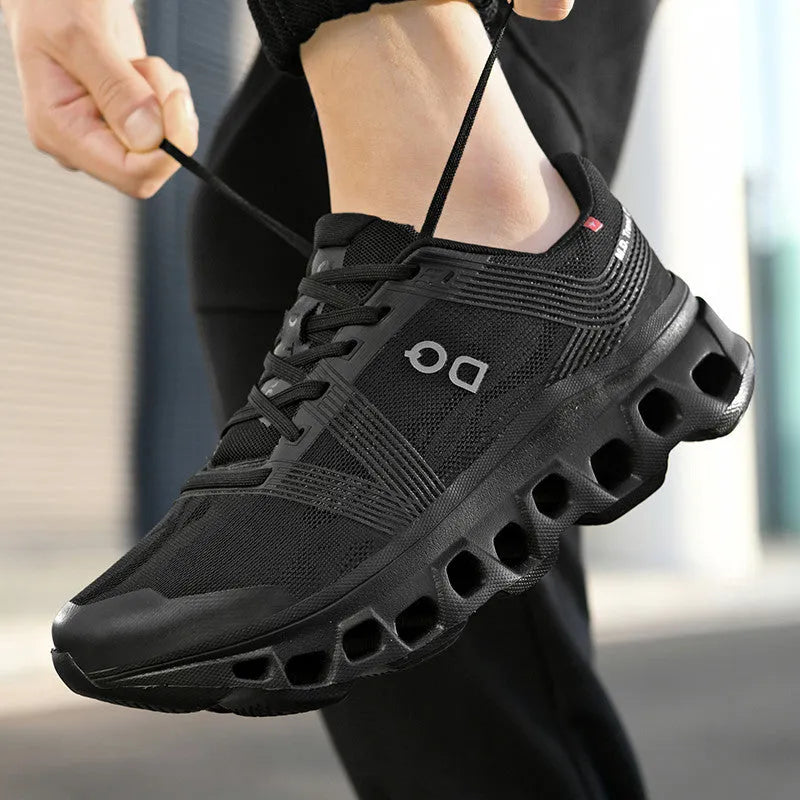 Men's casual running shoes with breathable mesh upper, low-top lace-up design, available in black