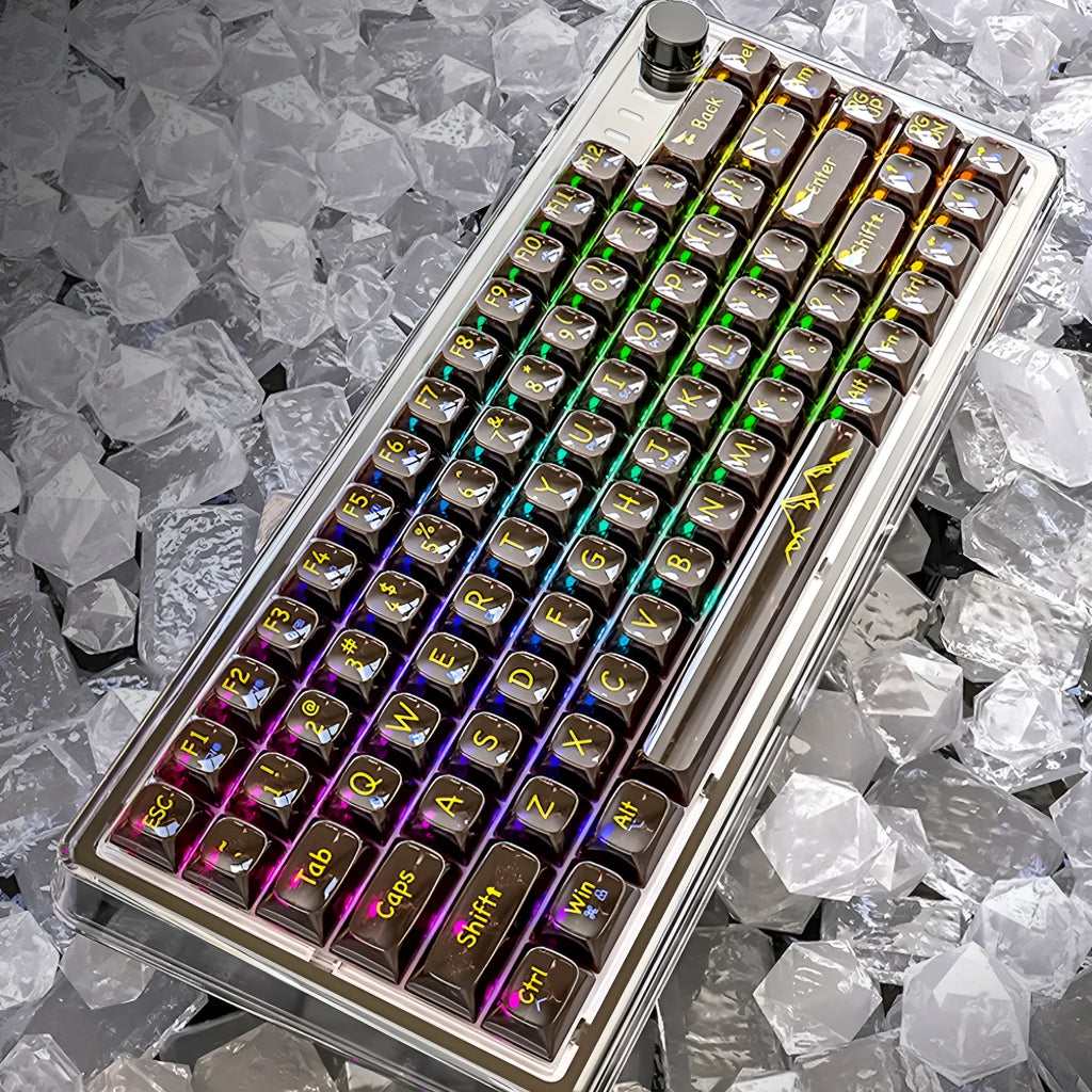 Attack Shark K75 white transparent wireless mechanical keyboard with RGB backlight on a desk.