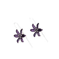 Pair of purple retro-style flower-shaped alloy earrings for women.