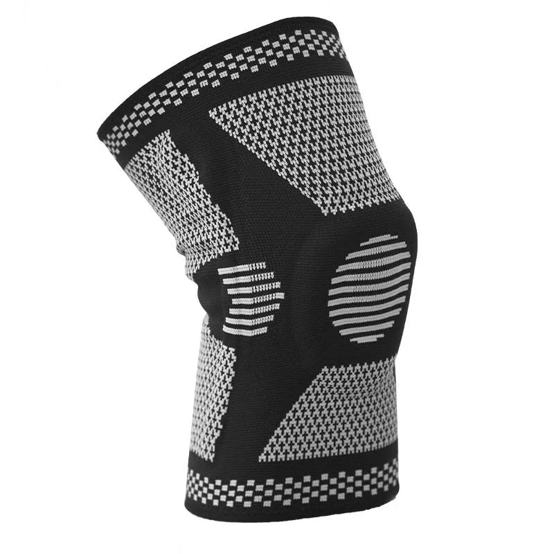 Green polyamide sports knee pad shown on leg, sizes M L XL for 35-55cm leg circumference.