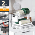 White double-layer kitchen storage rack with removable draining component on counter