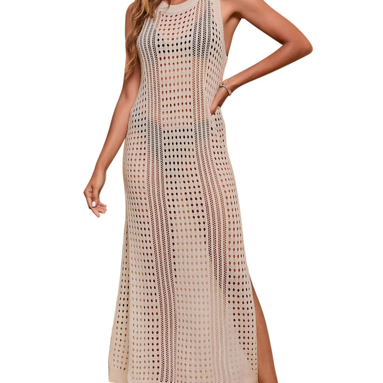 Women's long loose hollow-out knitted beach blouse in a solid colour with a cotton blend lining.