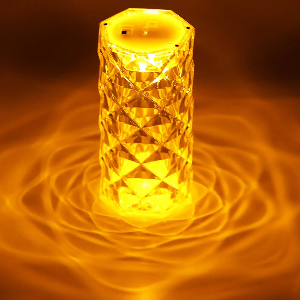 Clear acrylic crystal rose petal table lamp with plastic LED, warm white light, compact 12.2cm size on a desk