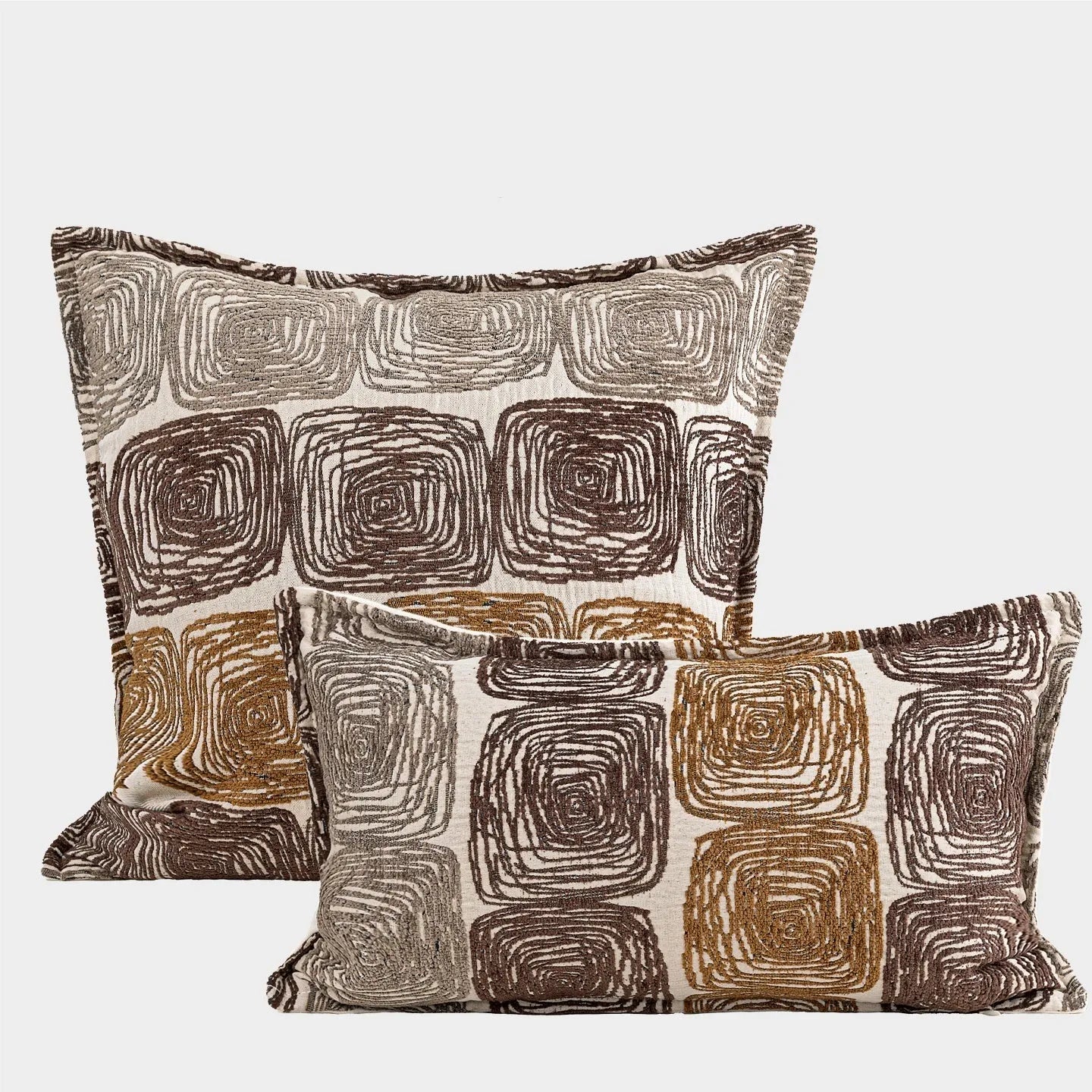 Square cream and coffee-coloured abstract coil pattern pillow cover, 50cm by 50cm.