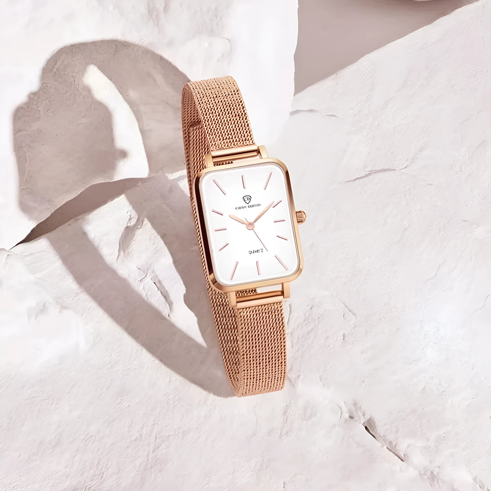 Women's waterproof quartz watch with alloy case and woven steel strap in rose gold or silver