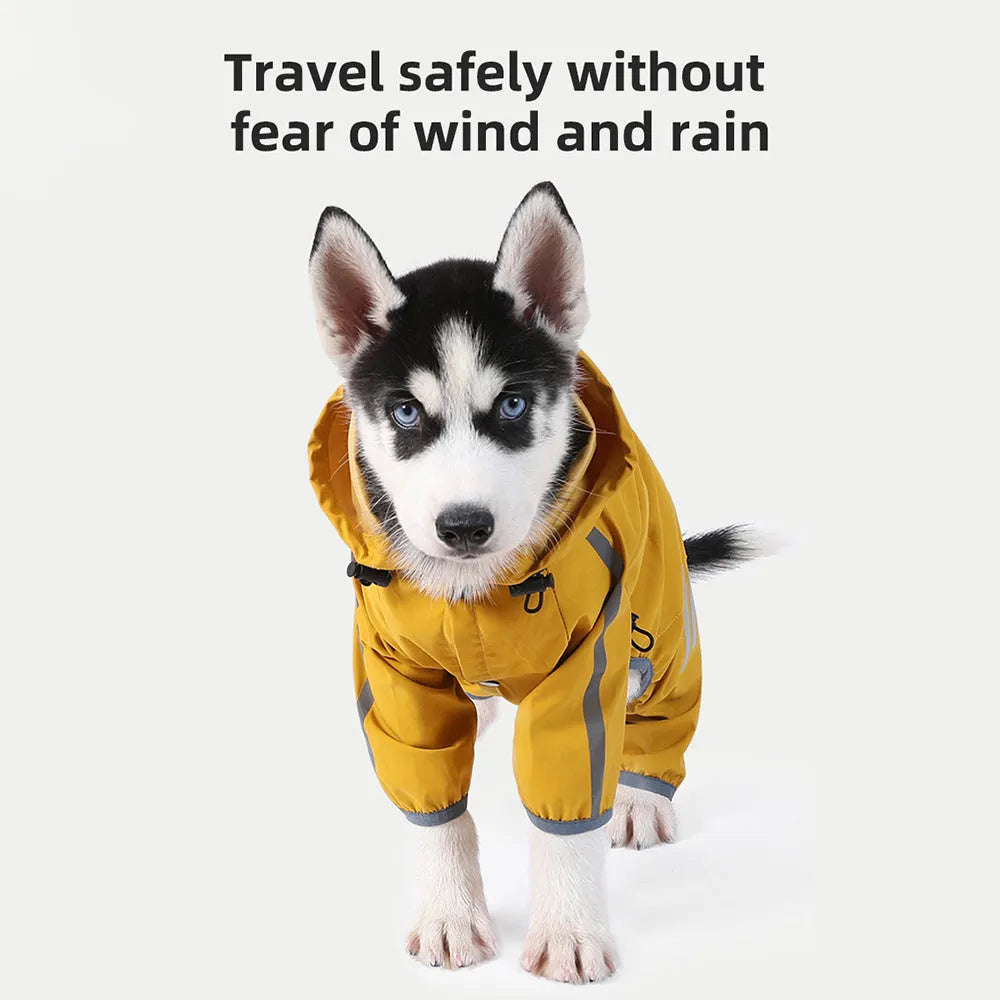 Waterproof dog raincoat with hood, reflective strips, and four-leg design on a small dog