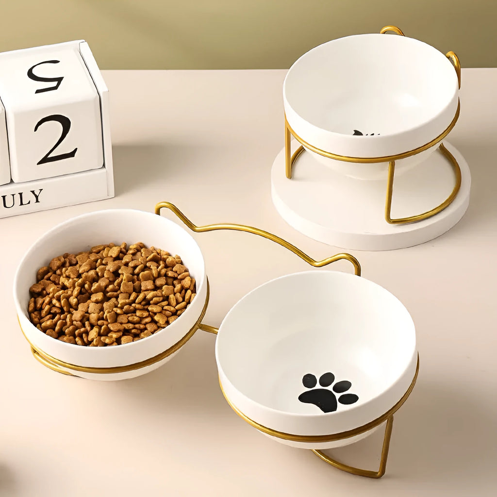 Ceramic cat bowl with iron frame in cat paw or fishbone print