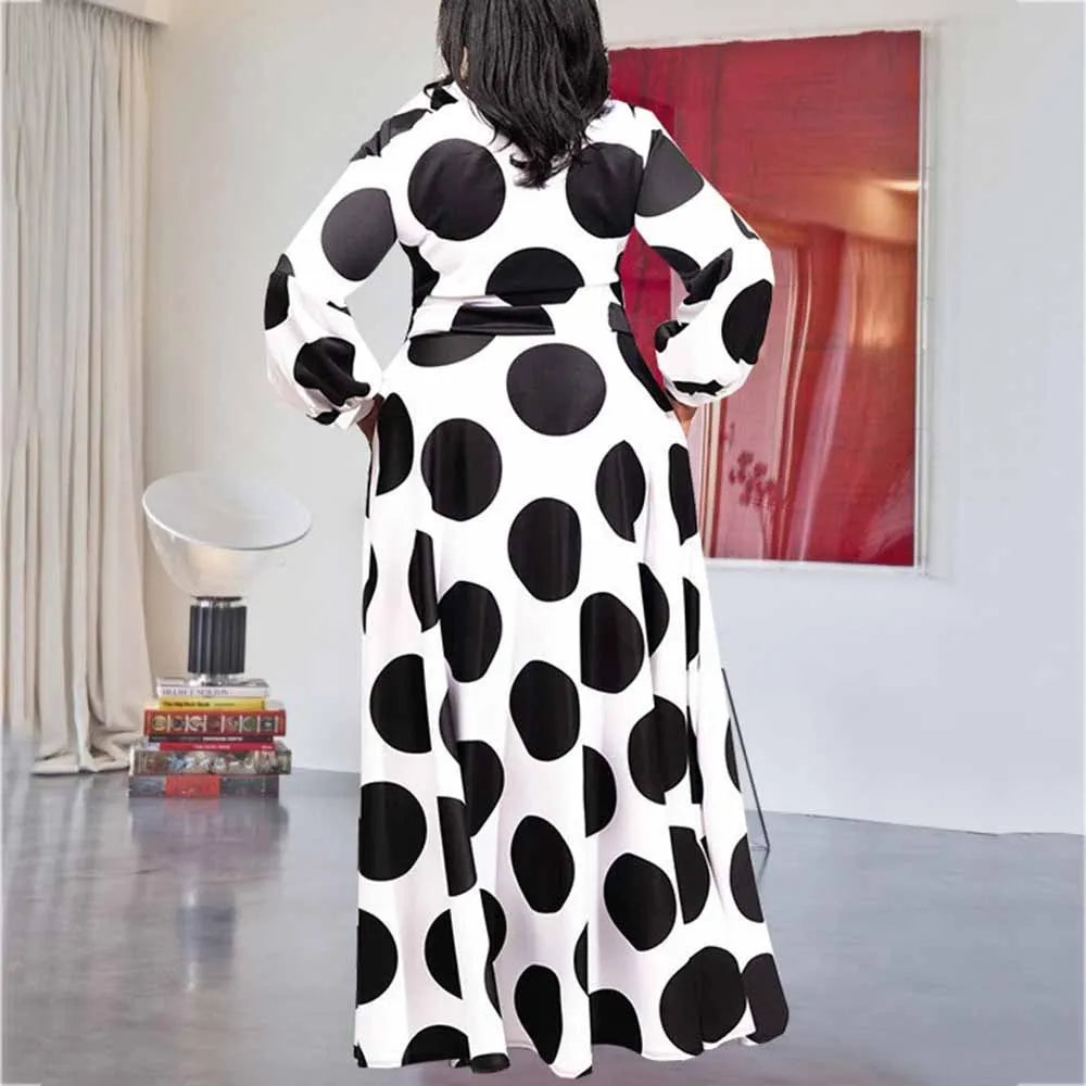 Women's large size white polka dot dress with long sleeves and long skirt, shown in white with white dots