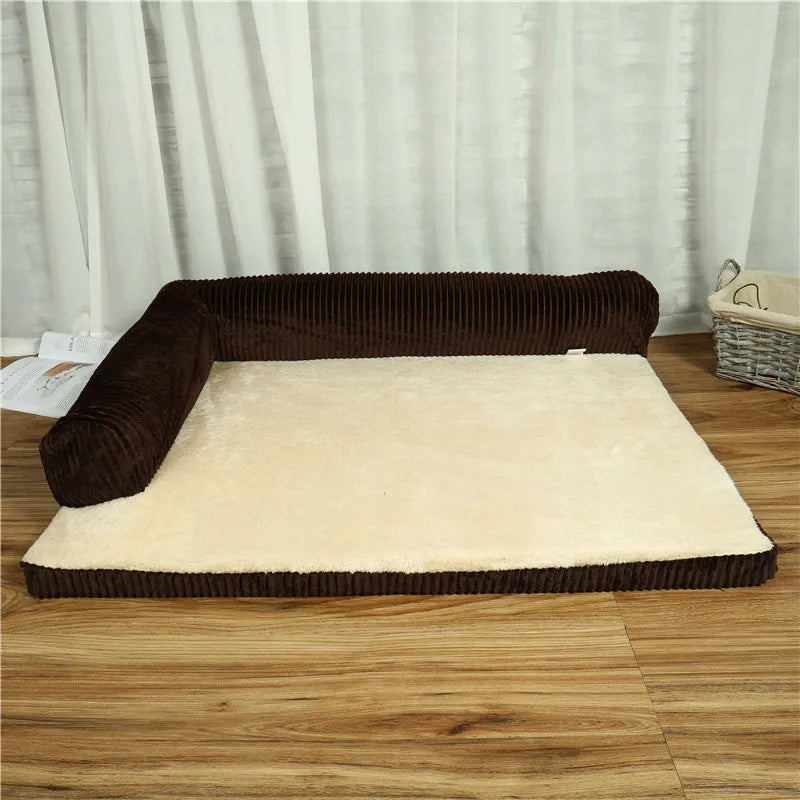 Corduroy pet sofa dog bed with bolster sides, shown in grey colour on a wooden floor