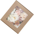 Silk flower bouquet in Lotus Pink Champagne Rose gift box with half-handmade arrangement on white background.