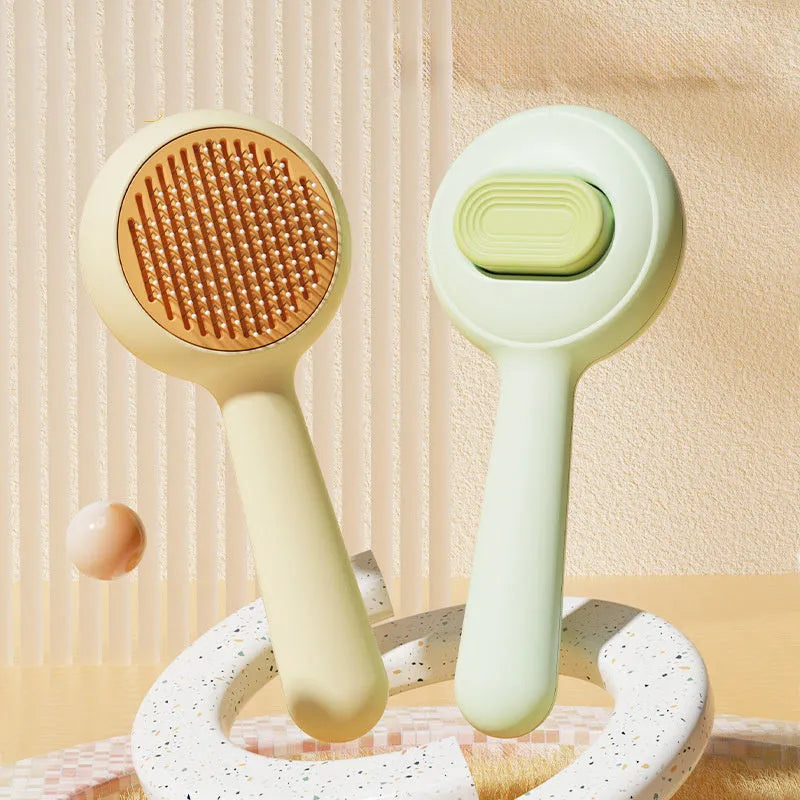 Green and yellow handled pet grooming brushes with stainless steel comb teeth for removing loose hair from cats and dogs.