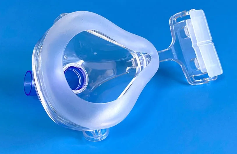 Transparent CPAP breathing mask with silicone seal and adjustable headgear