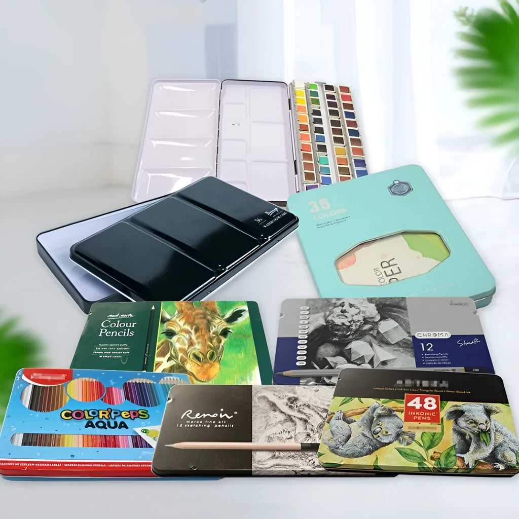 Tinplate metal watercolour paint box for solid pigments in three folding sizes.