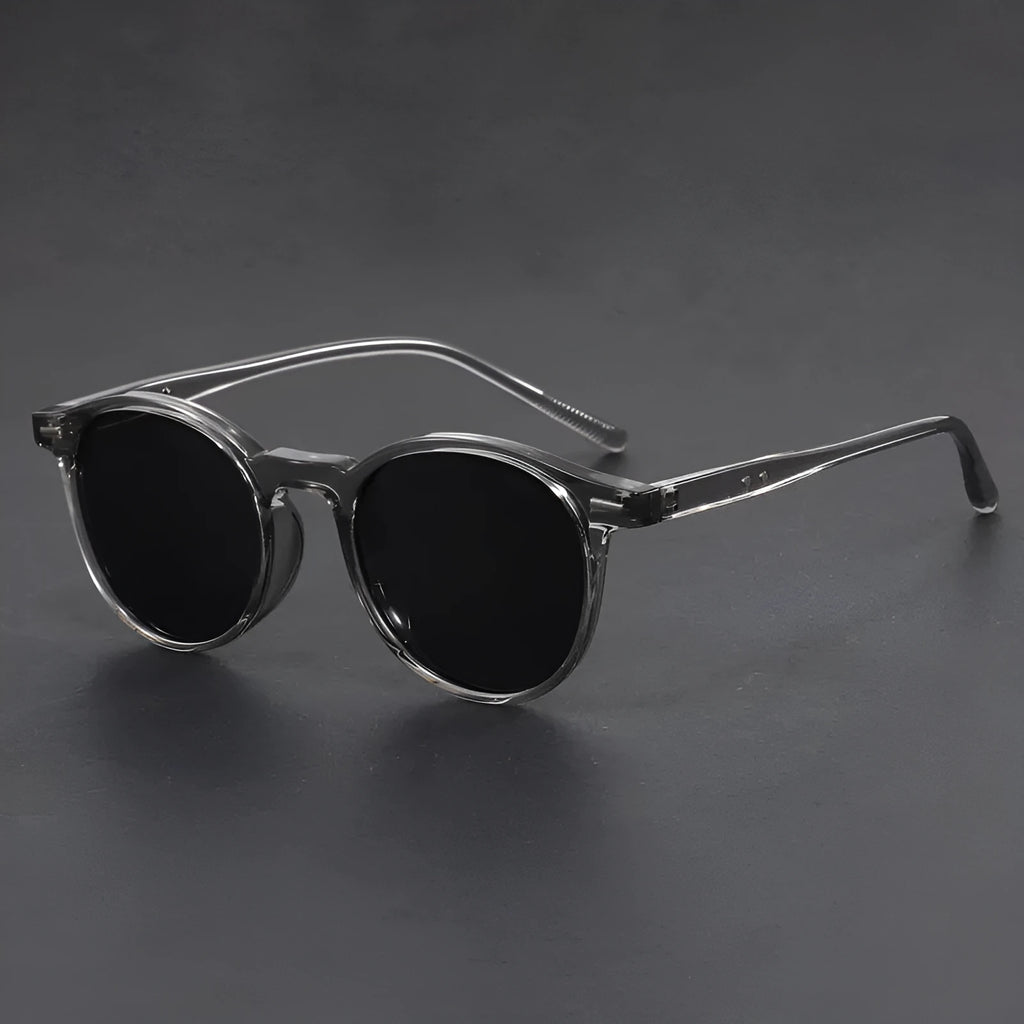 Retro sunglasses with round frame and polarised grey lenses in multiple colour options