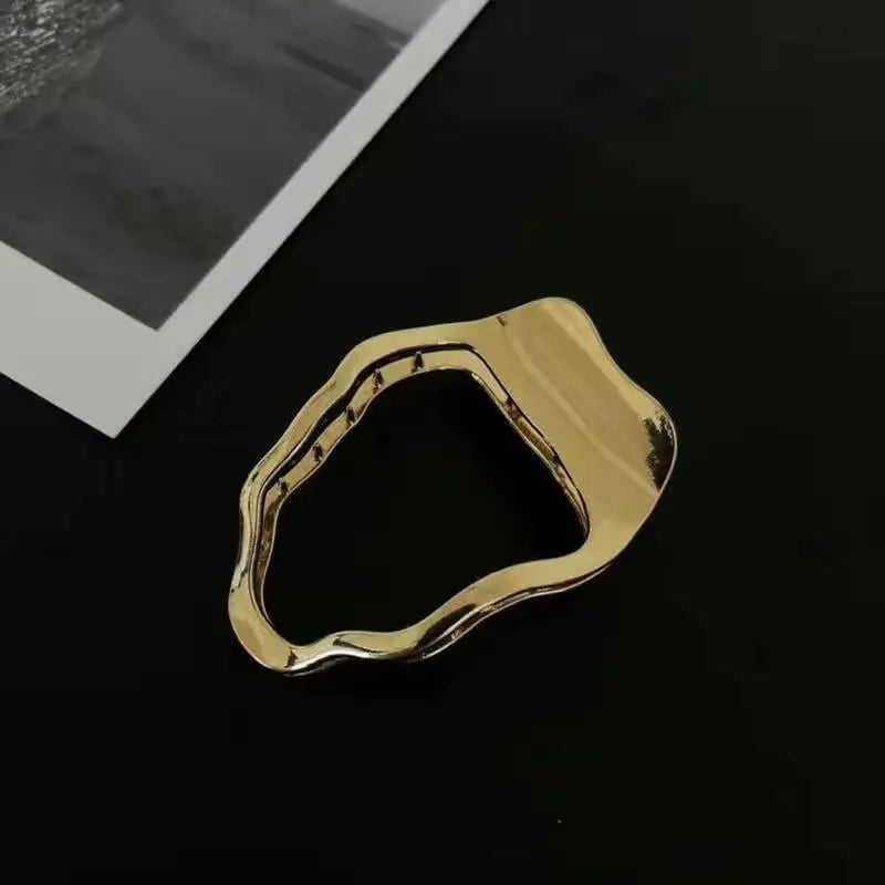 Women's zinc alloy hair barrettes in gold and silver with arc, square and triangle shapes