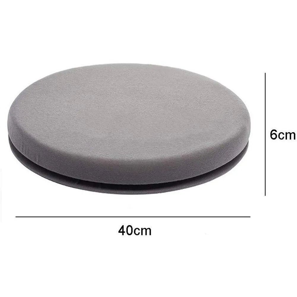 Circular grey rotating car seat cushion for elderly passengers on a car seat