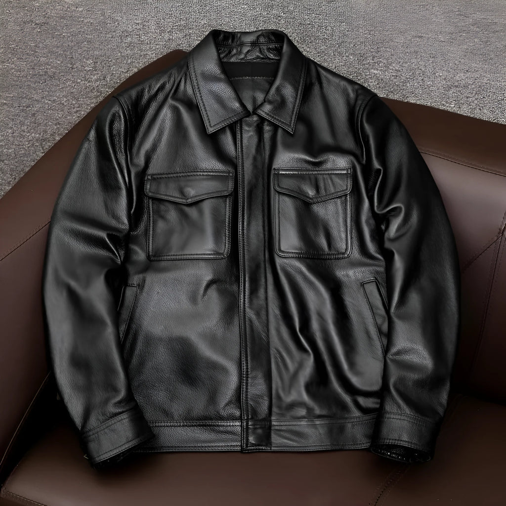 Men's black plus size PU leather jacket with side pockets on a mannequin, showing loose fit.