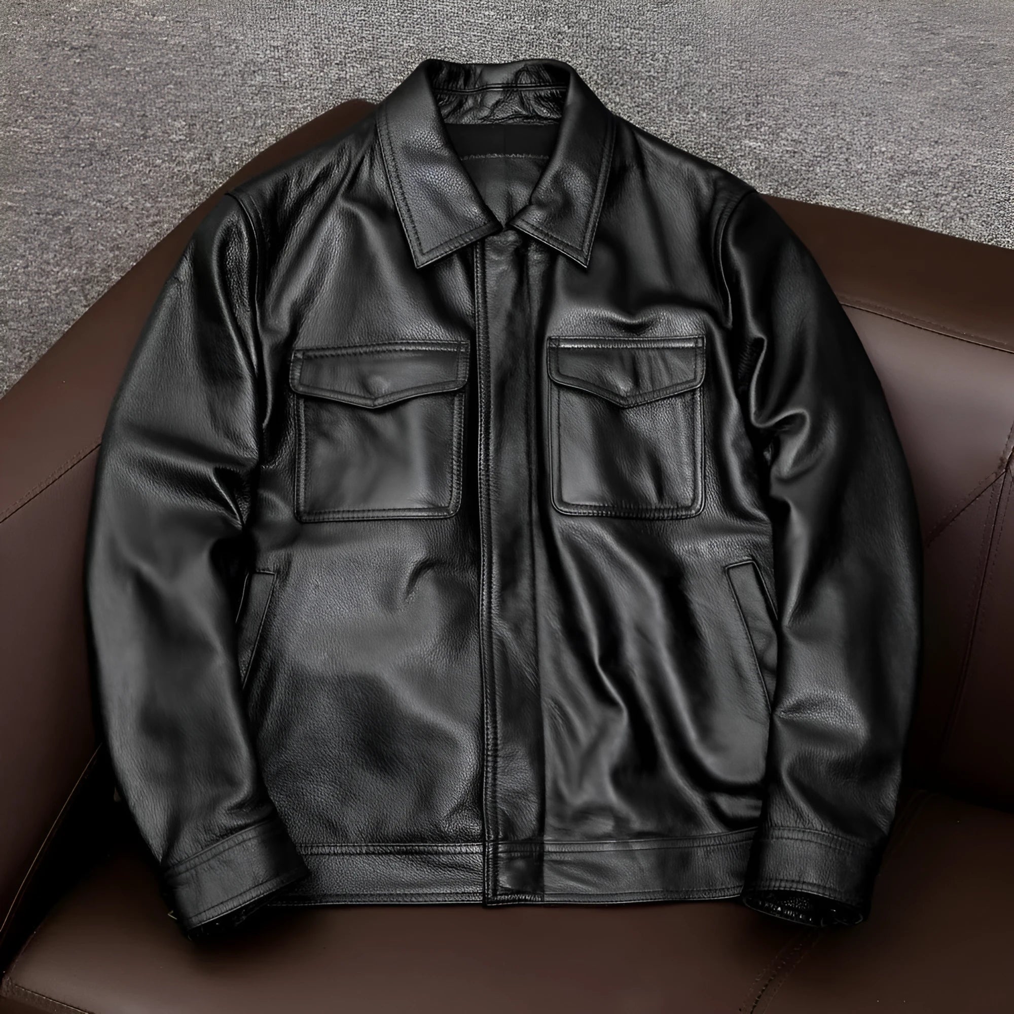 Men's black plus size PU leather jacket with side pockets on a mannequin, showing loose fit.