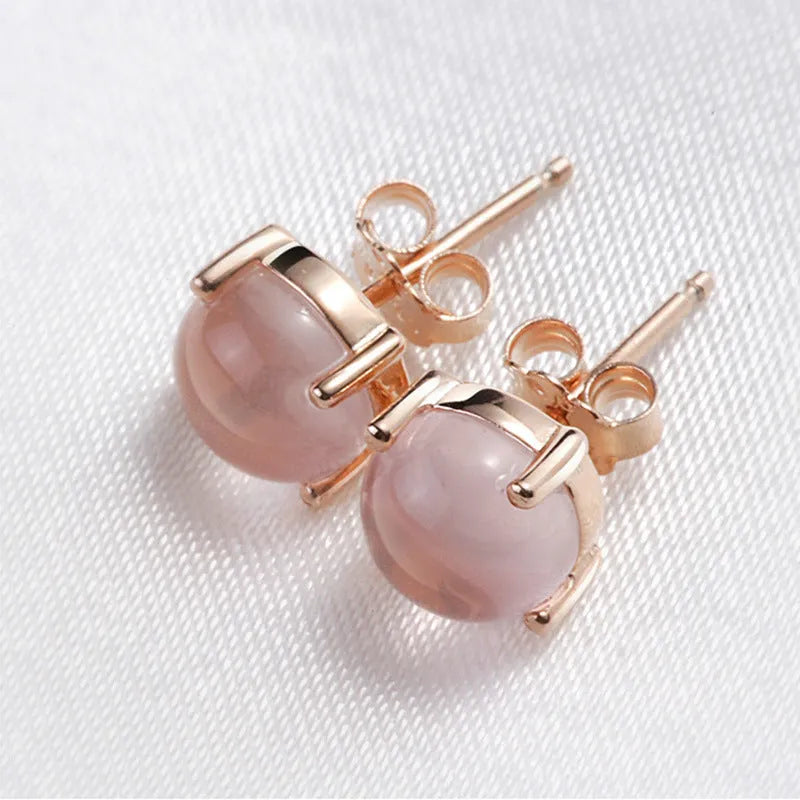 Women's rose gold drop shape stud earrings with crystal inlay detailing in Korean style