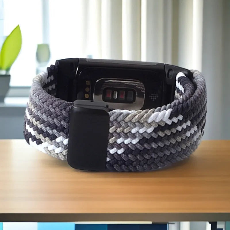 Woven elastic magnetic watch band in black for Fitbit Charge 5 with metal magnetic buckle and nylon strap