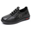 Plus size PU soft bottom slip-on mom shoes in black with leaf pattern, flat heel, and shallow mouth design