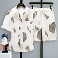 Men's grey casual short sleeve top and matching shorts two-piece set on a hanger.