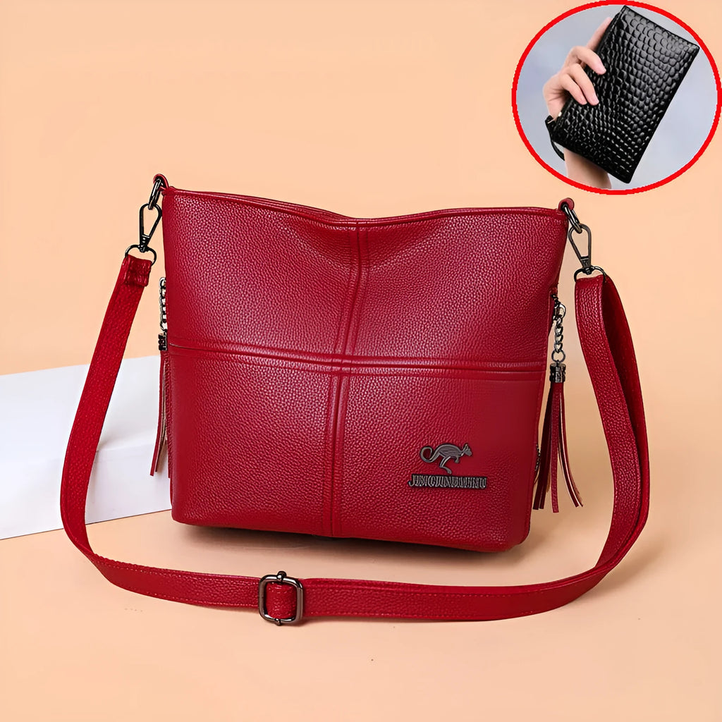 PU soft-leather-texture crossbody bag in red with stitching and tassels, horizontal shape, large capacity