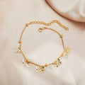 Alloy butterfly anklet for women in gold finish on ankle, hollow design beach foot ornament