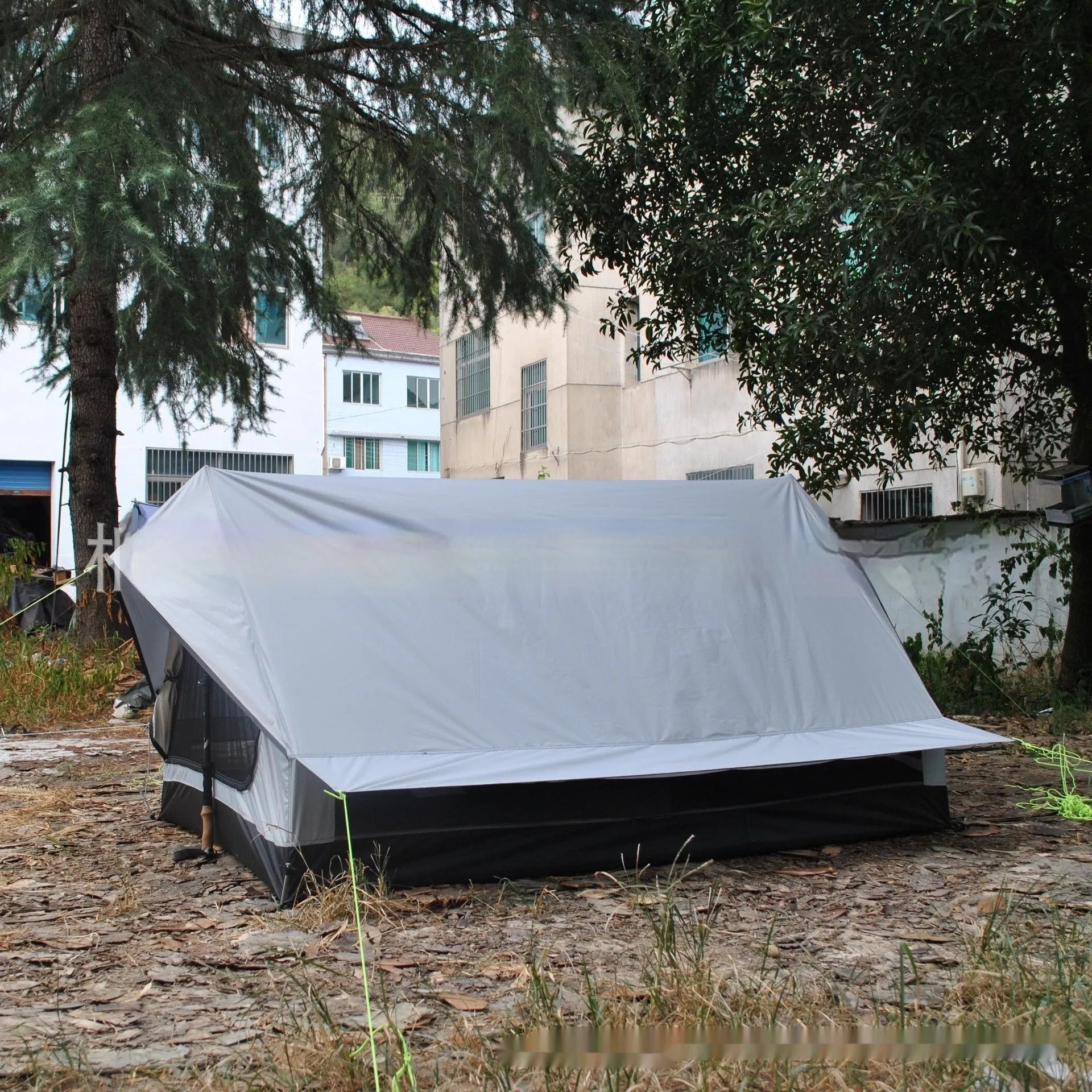 Brown or white A-line hiking tent pitched with hiking poles showing 210x150x110cm dimensions